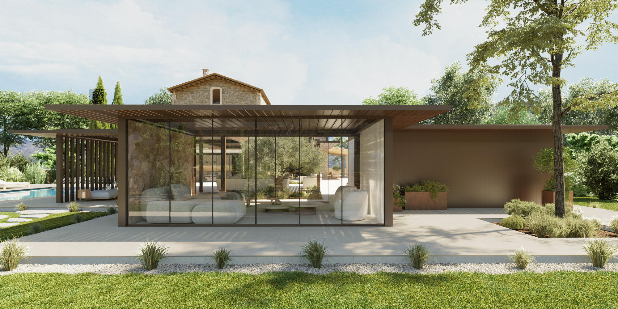 Glazed Neutro pavilion in front of a stone Mediterranean house